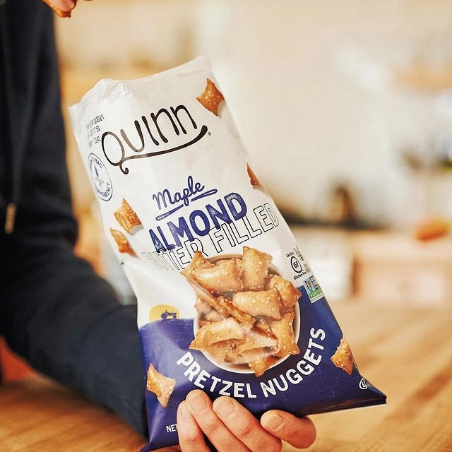 Partake snack packs next to pretzels for a summer trip